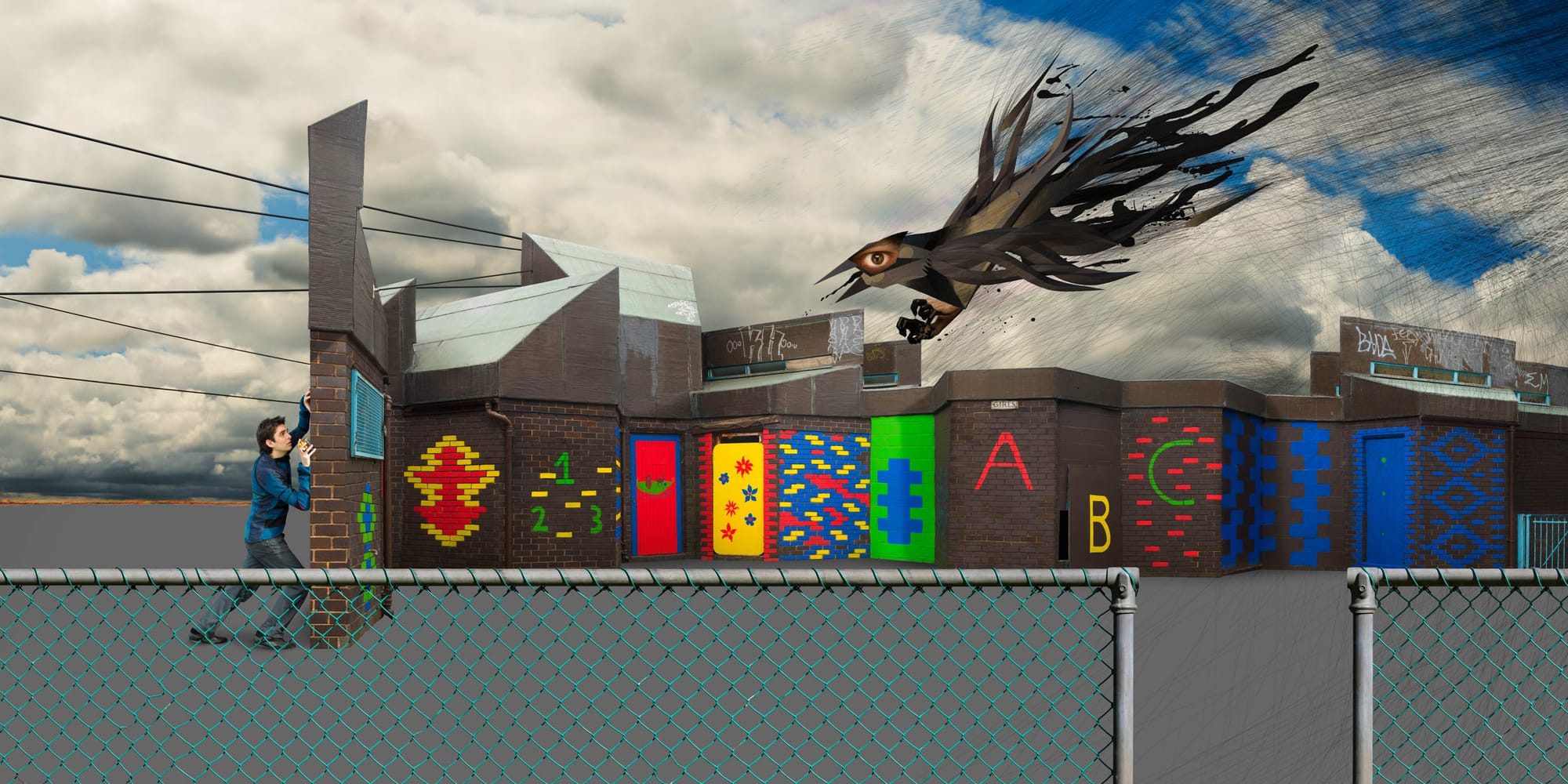 A child running behind a chain-link fence in front of a graffitied brick wall, with a large dark winged creature flying in the sky above.