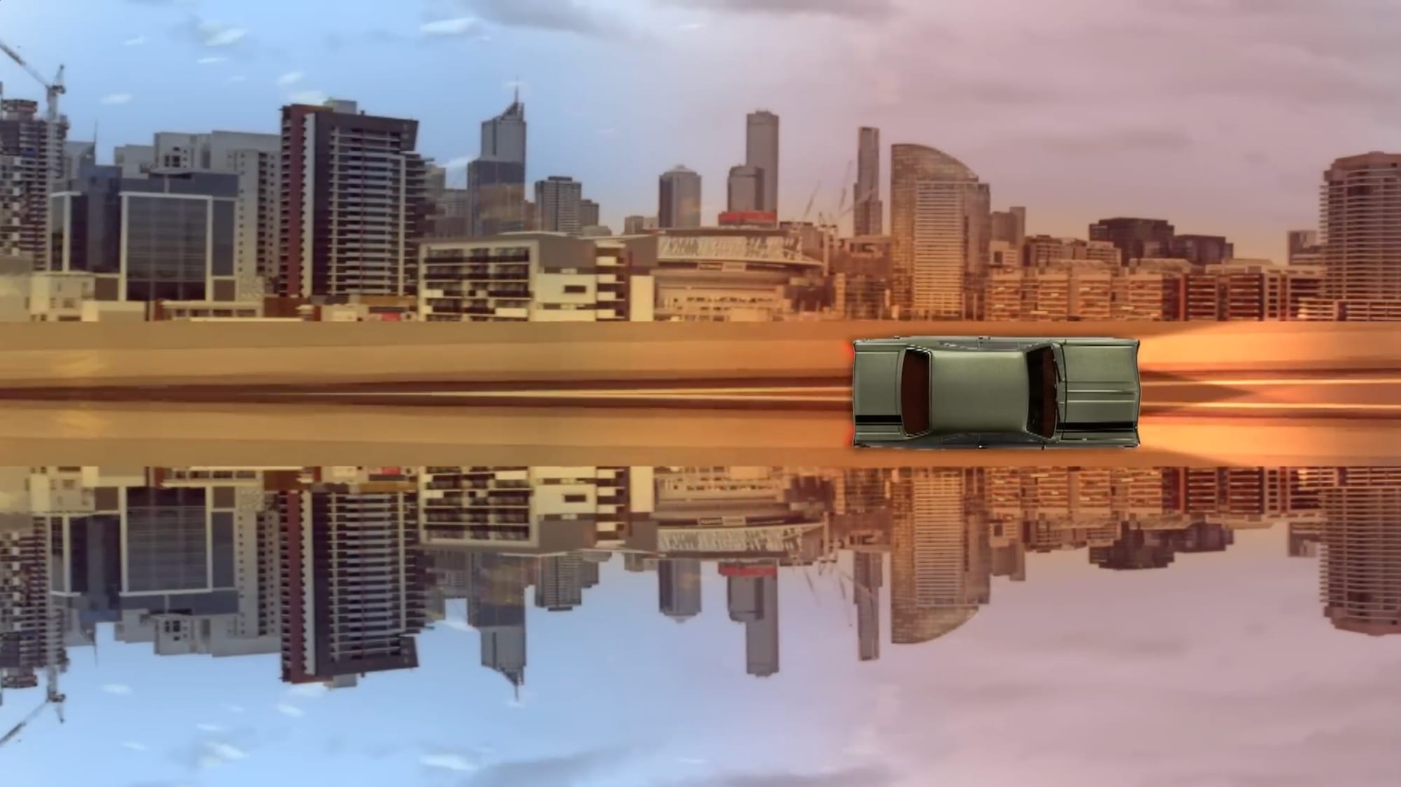 The Melbourne skyline mirrored along the waterline at sunset, a single car suspended at the centre of the frame